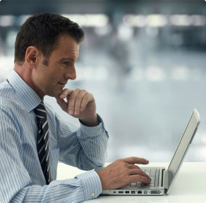 Man working on computer.
