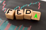The Fed Steps Forward as the Oil Shock Steps Back